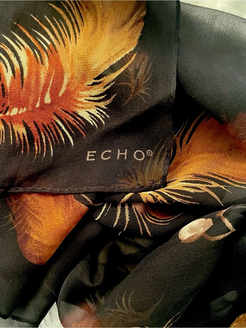 Echo! Black Scarf with Orange and Gold Feather Motif!